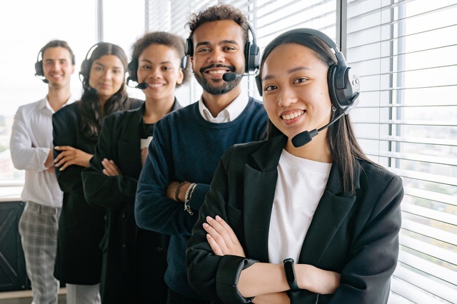 call center staff in front of a window