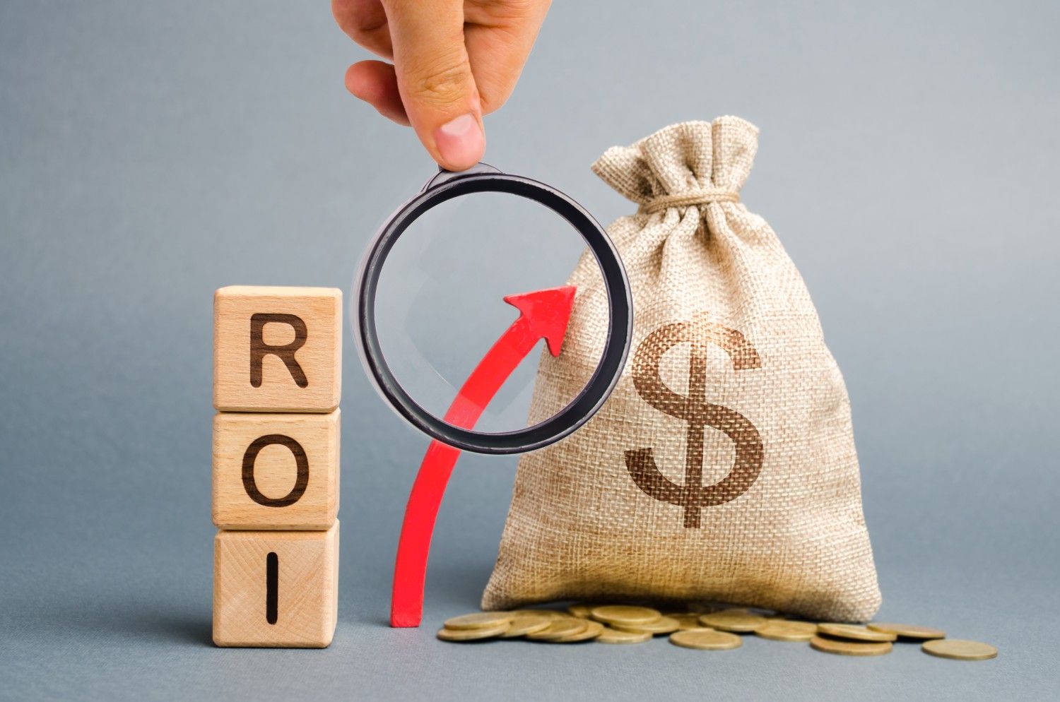 wooden blocks with the word ROI to get the best bang for buck
