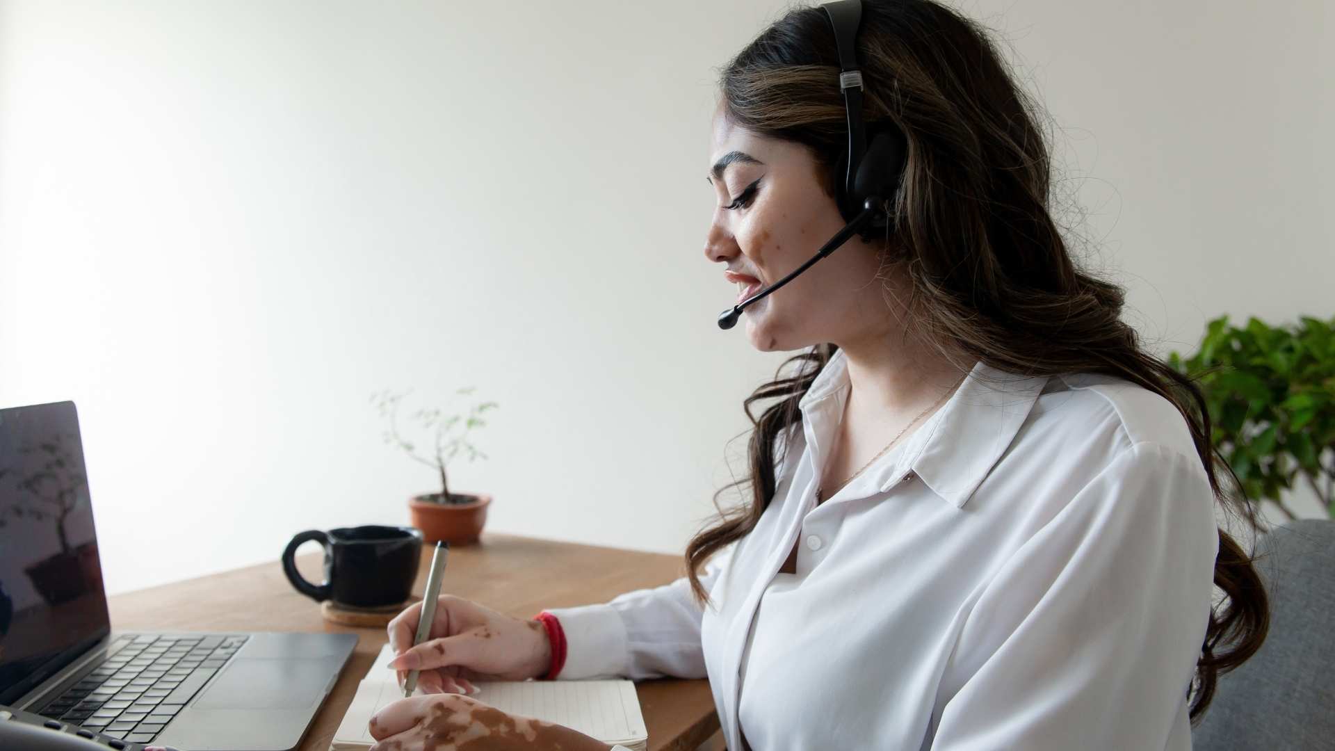 a BPO call center agent working at her desk.