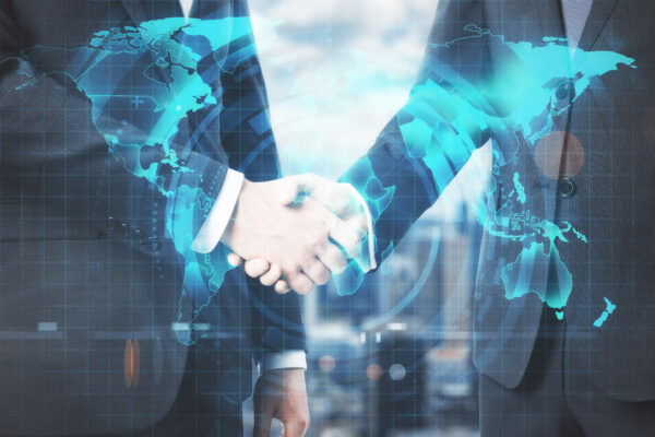 a client and a BPO partner shaking hands with a world map overlay.